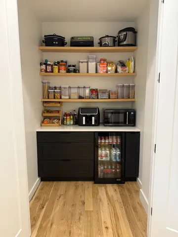 a view of water heater and cabinet