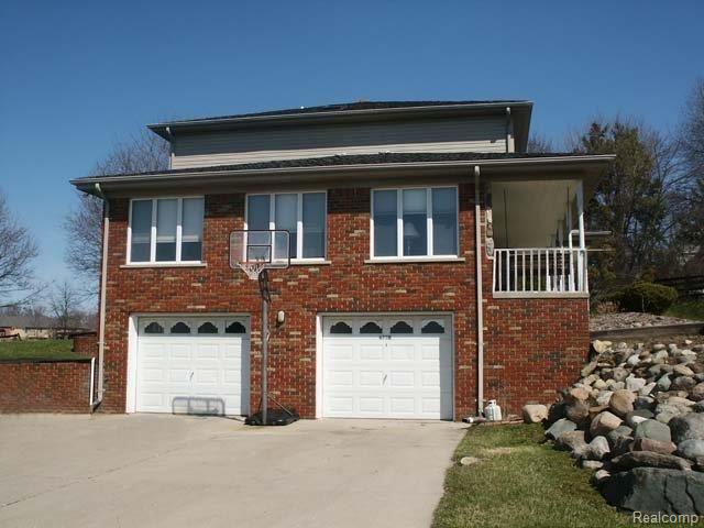 4750 North Rochester Road Rochester, MI 48306 - Photo 15 of 20 Roomy 2-car garage
