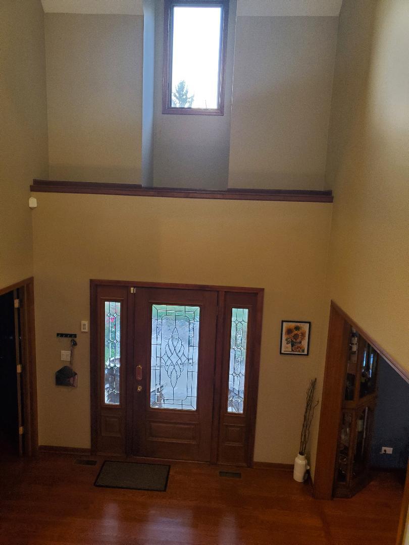 1385 Stonegate Road Algonquin, IL 60102 - Photo 6 of 32 a front view of a house with entryway