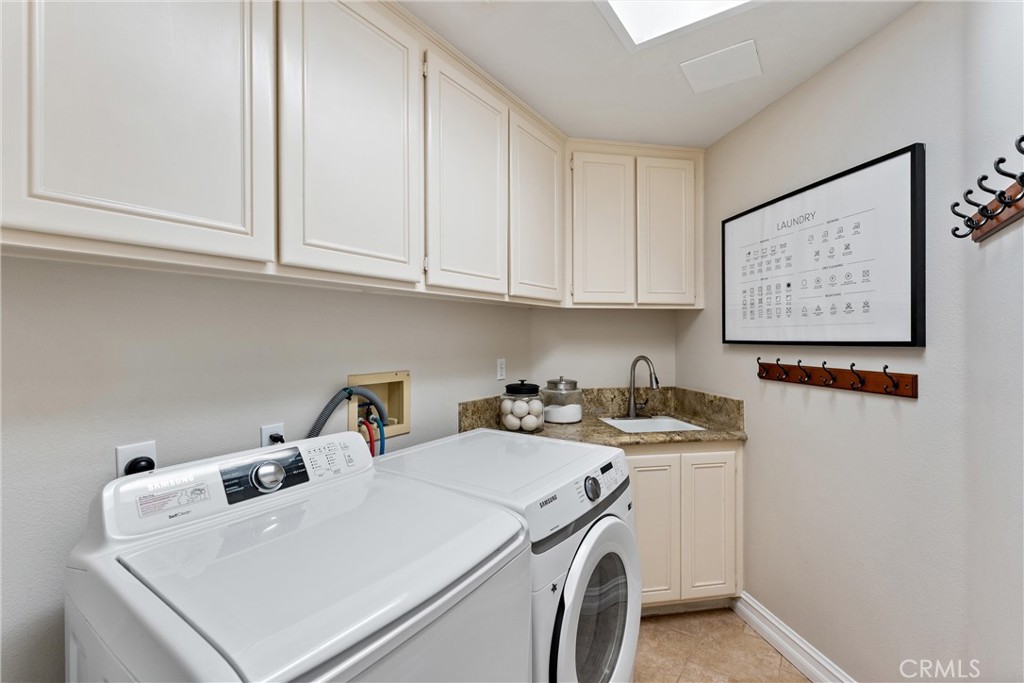 2741 Timmons Tustin, CA 92782 - Photo 12 of 30 a utility room with dryer and washer