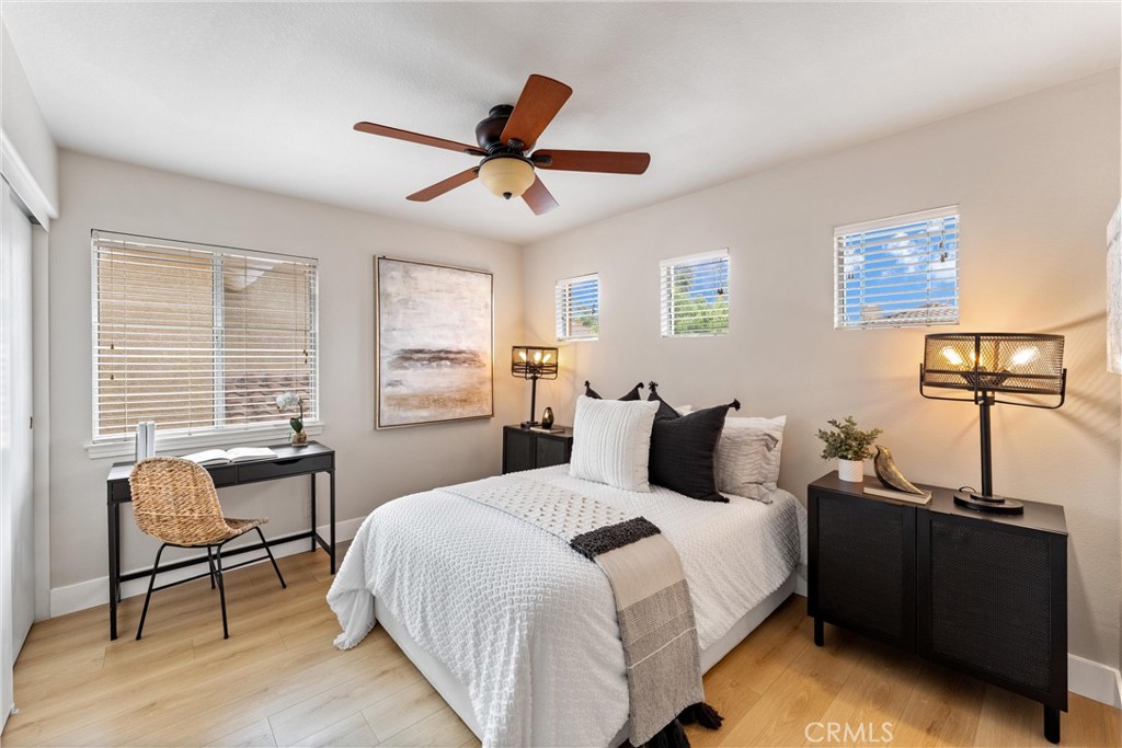 2741 Timmons Tustin, CA 92782 - Photo 14 of 30 a bedroom with a bed and a window