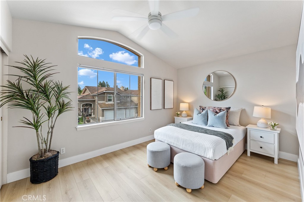 2741 Timmons Tustin, CA 92782 - Photo 17 of 30 a bedroom with a bed and a potted plant