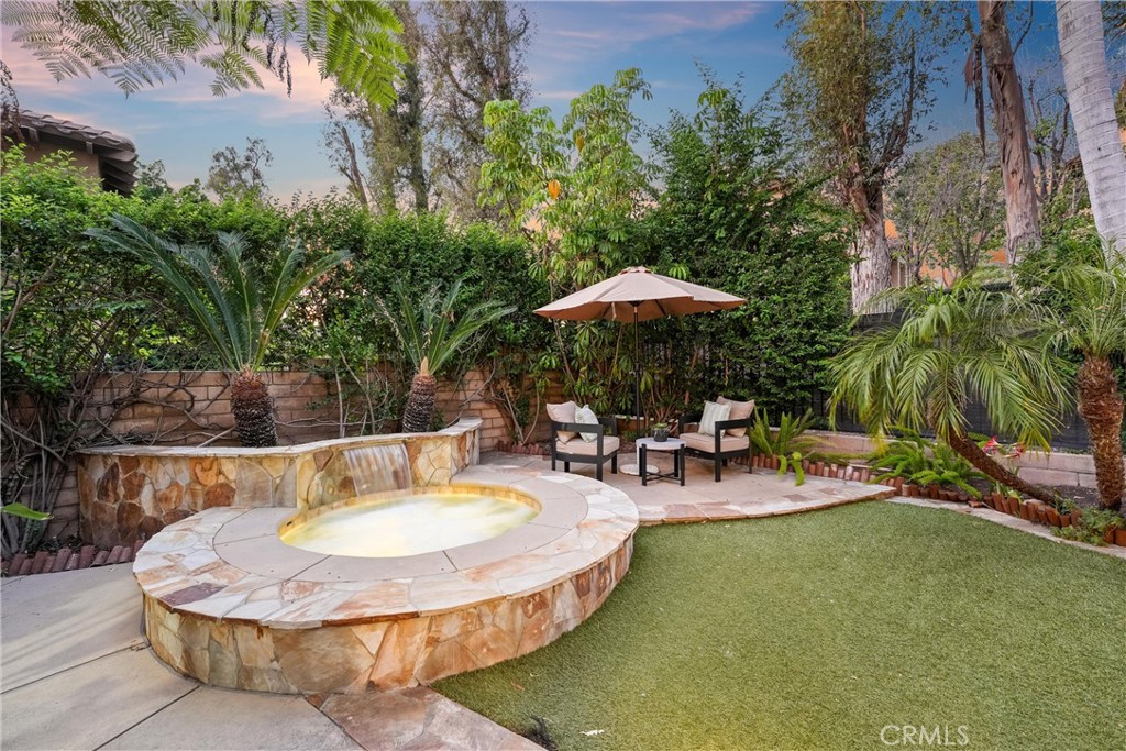 2741 Timmons Tustin, CA 92782 - Photo 25 of 30 a view of a swimming pool with chairs
