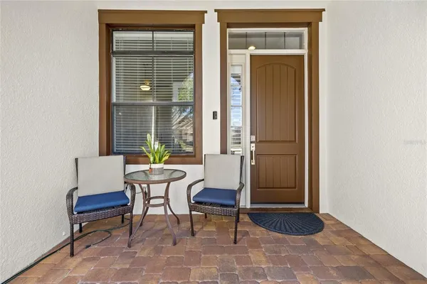 a living room with a furniture and a window