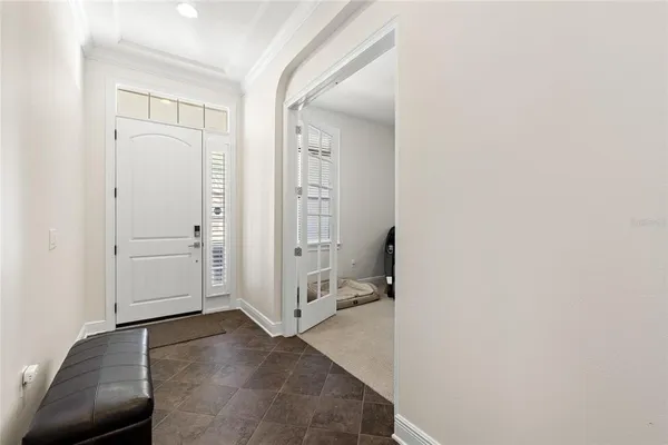 wooden floor with white walls