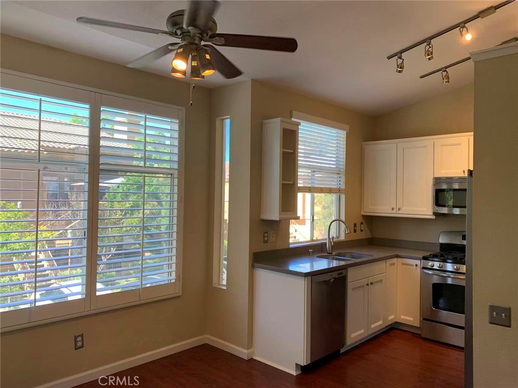 19431 Rue De Valore, Unit 50A Lake Forest, CA 92610 - Photo 9 of 37 Dining area and kitchen