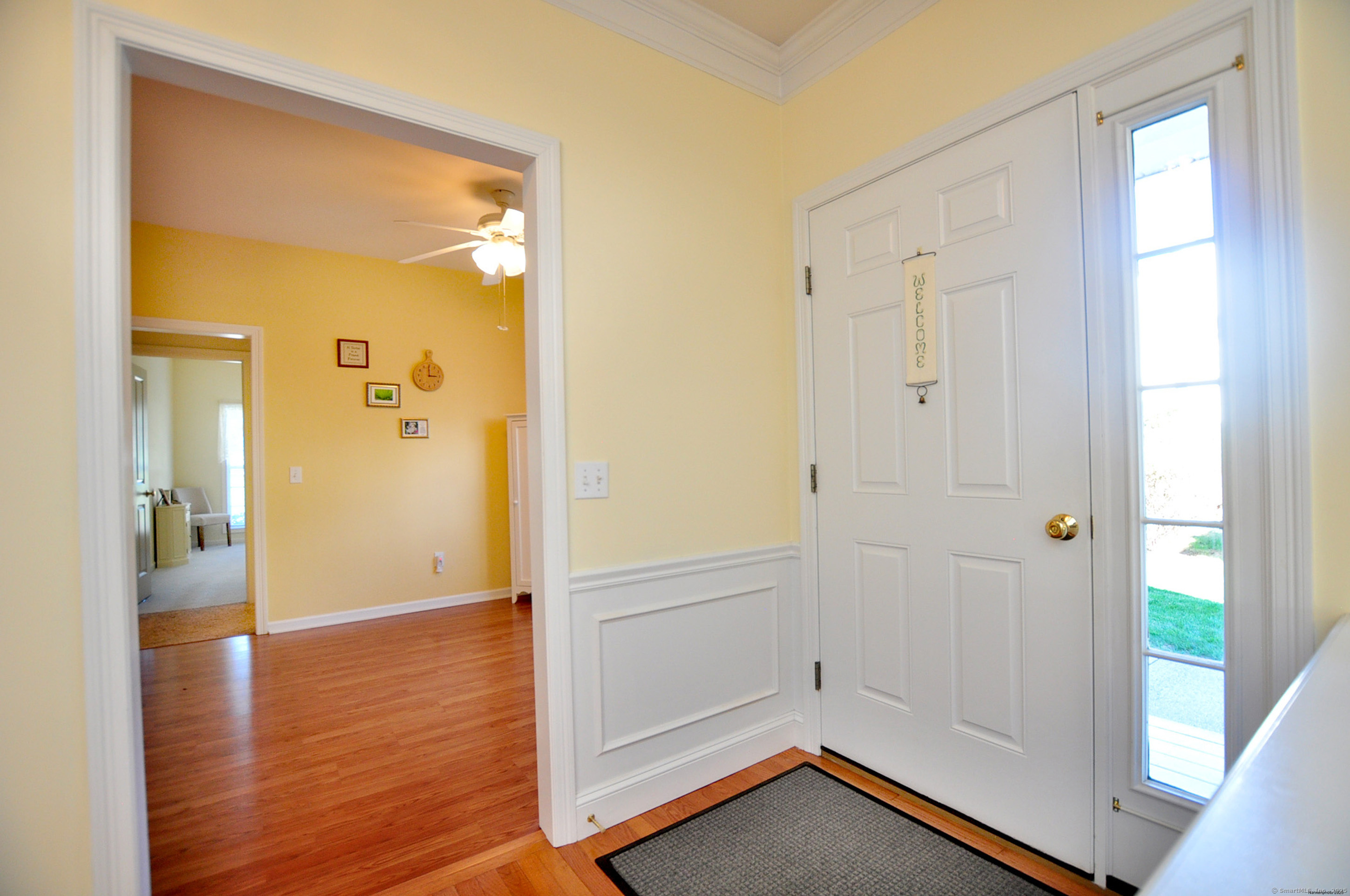 77 Carlson Ridge Road, Unit 77 New Milford, CT 06776 - Photo 12 of 40 wooden floor with white walls