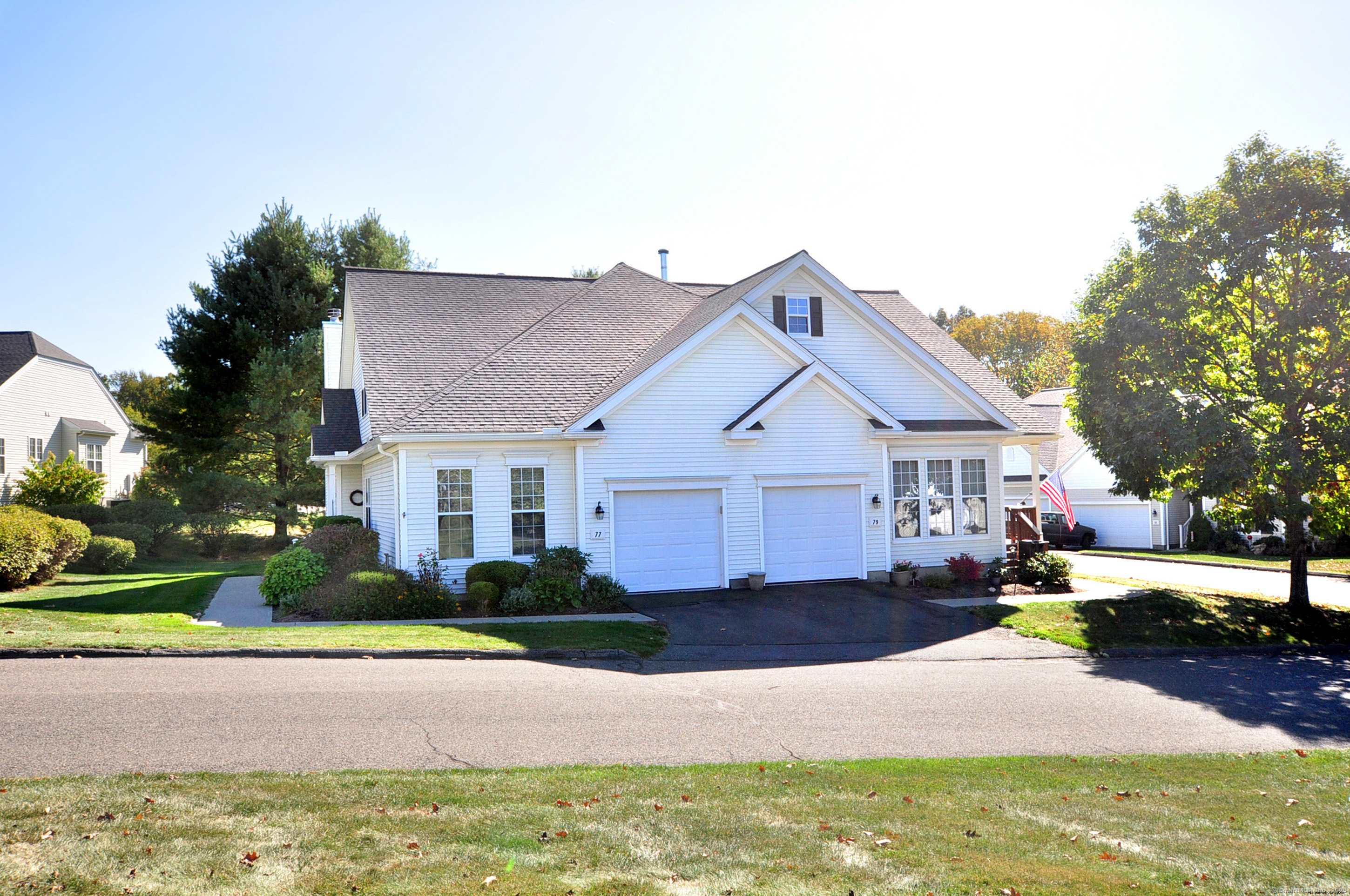 77 Carlson Ridge Road, Unit 77 New Milford, CT 06776 - Photo 2 of 40 a view of a house with a yard
