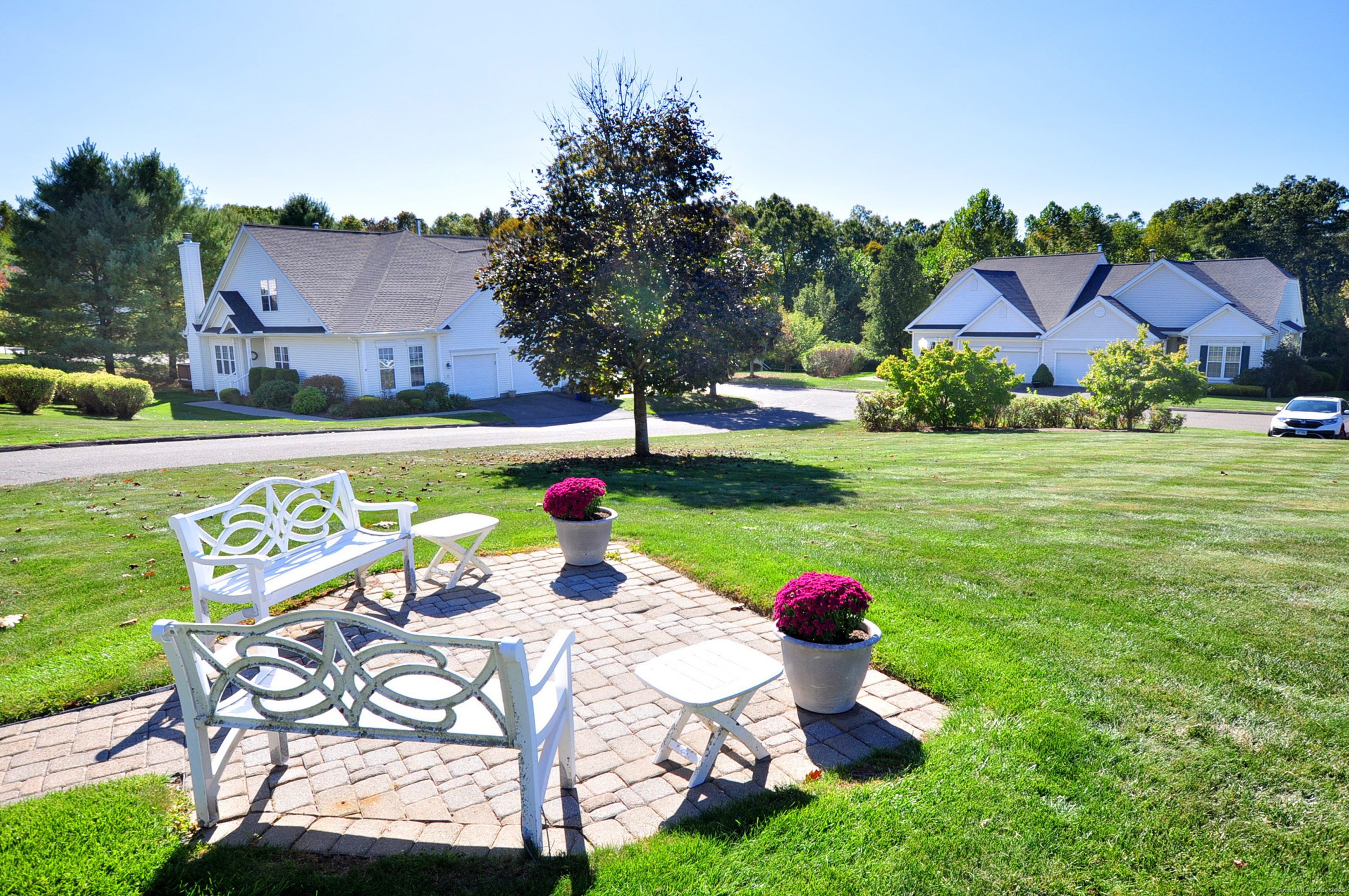 77 Carlson Ridge Road, Unit 77 New Milford, CT 06776 - Photo 3 of 40 a view of a house with a yard