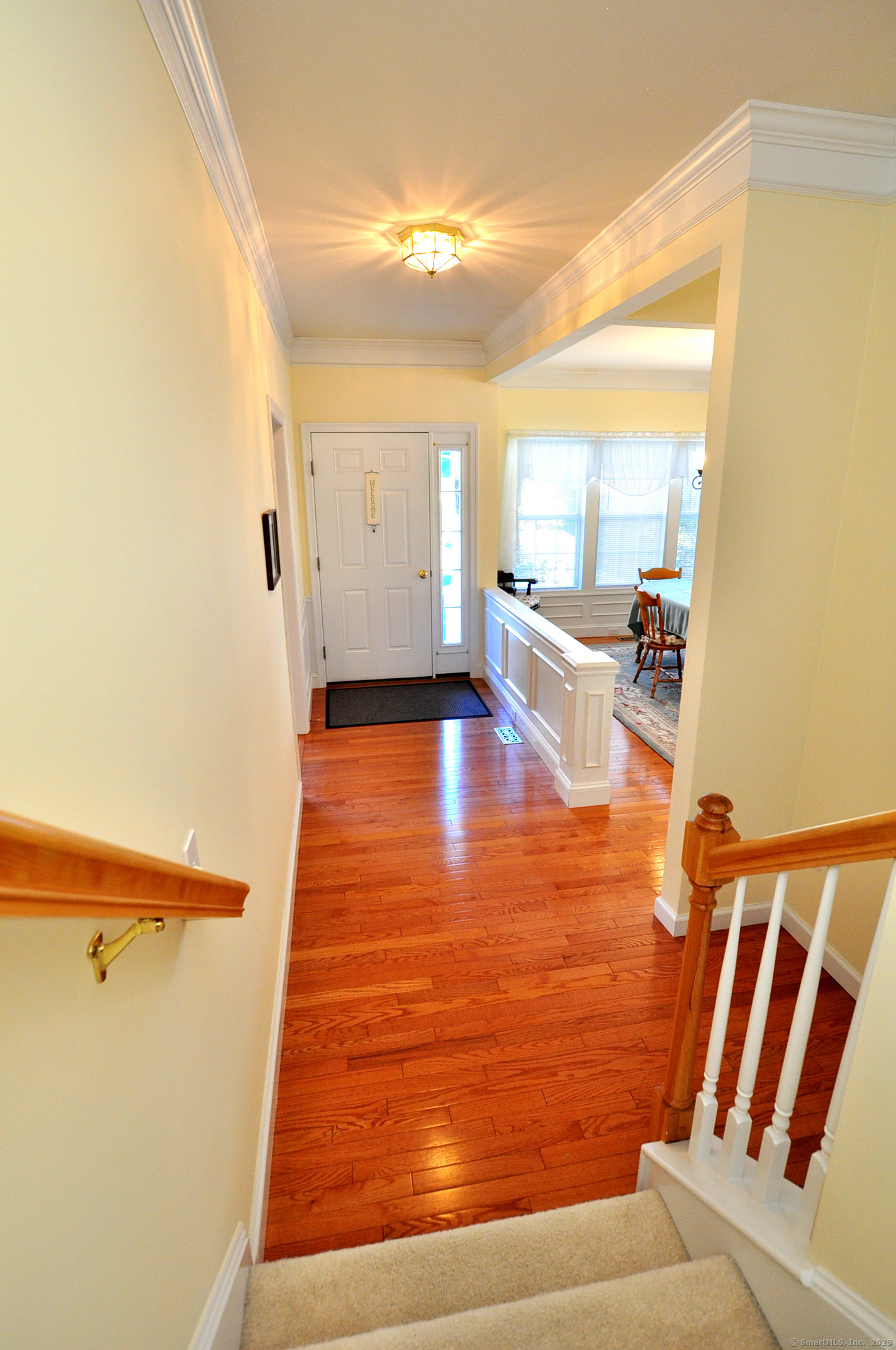 77 Carlson Ridge Road, Unit 77 New Milford, CT 06776 - Photo 38 of 40 a view of a living room and hardwood floor