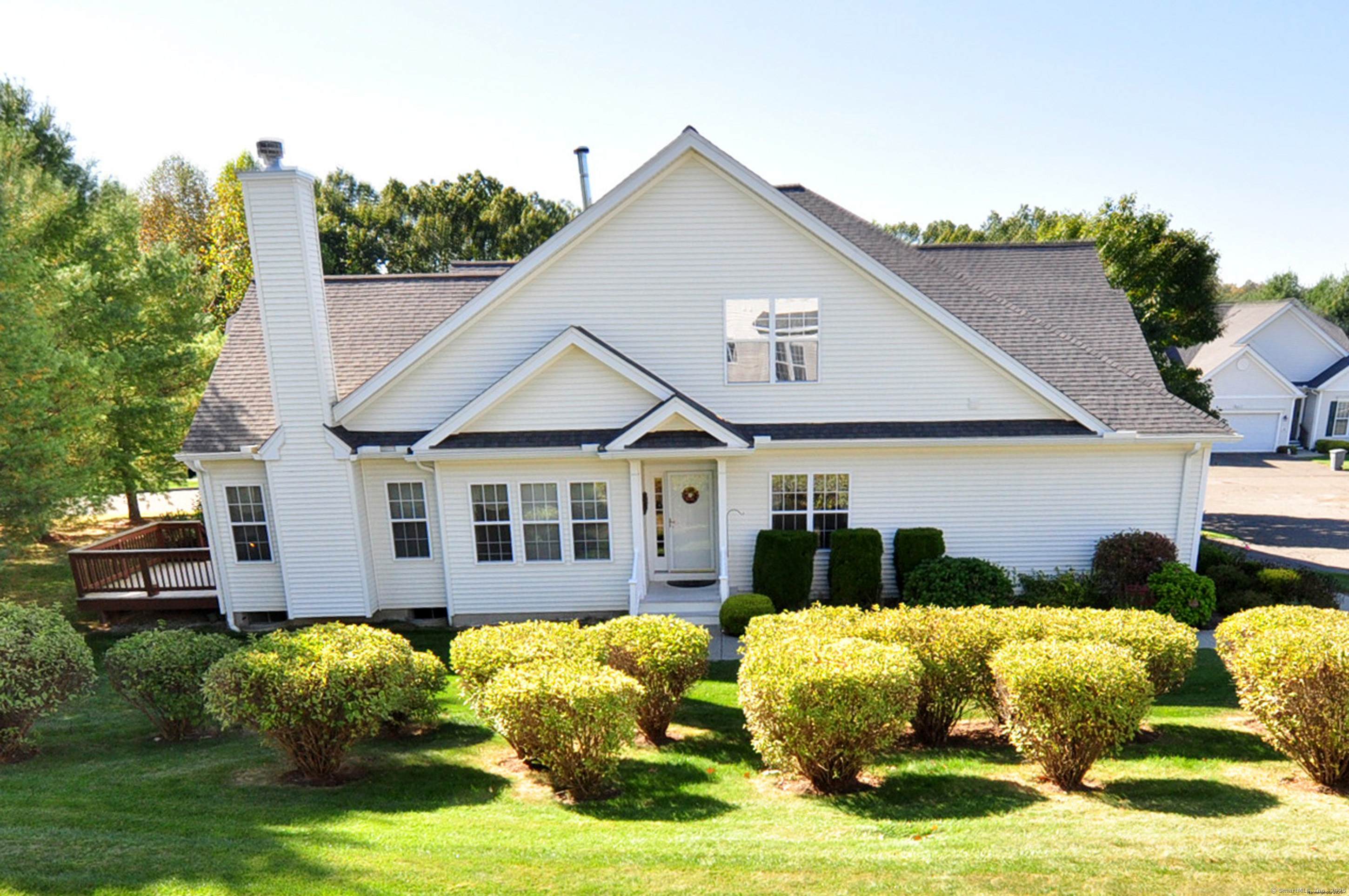 77 Carlson Ridge Road, Unit 77 New Milford, CT 06776 - Photo 4 of 40 a front view of a house with a yard