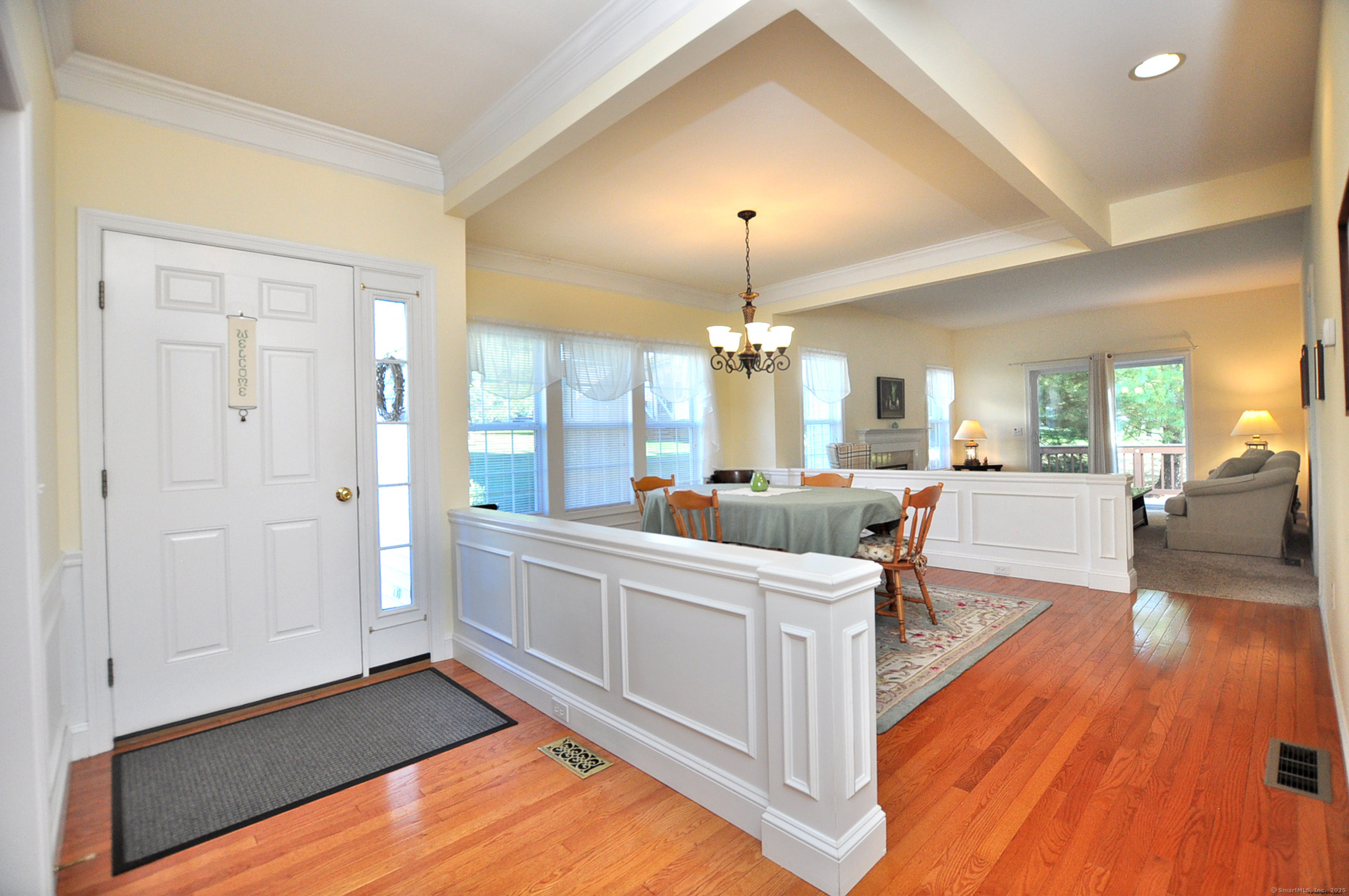 77 Carlson Ridge Road, Unit 77 New Milford, CT 06776 - Photo 7 of 40 a view of a living room and kitchen view