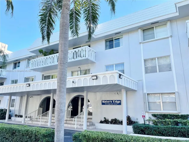 a view of a building with a street