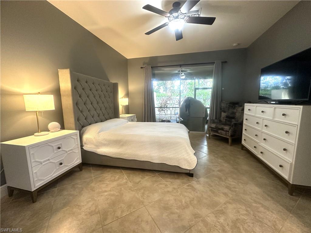 13462 Kent Street Naples, FL 34109 - Photo 14 of 30 a bedroom with a bed and window