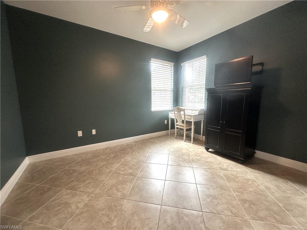 13462 Kent Street Naples, FL 34109 - Photo 20 of 30 a view of a livingroom with furniture and a window