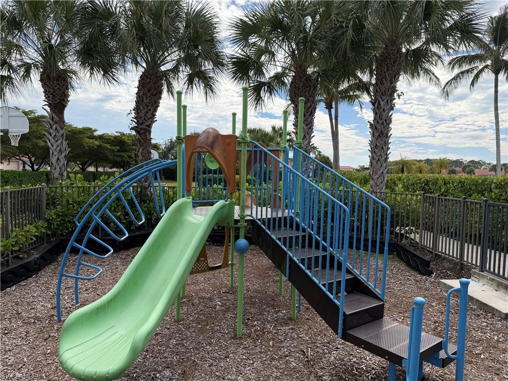 13462 Kent Street Naples, FL 34109 - Photo 26 of 30 a view of a roof deck with a small deck
