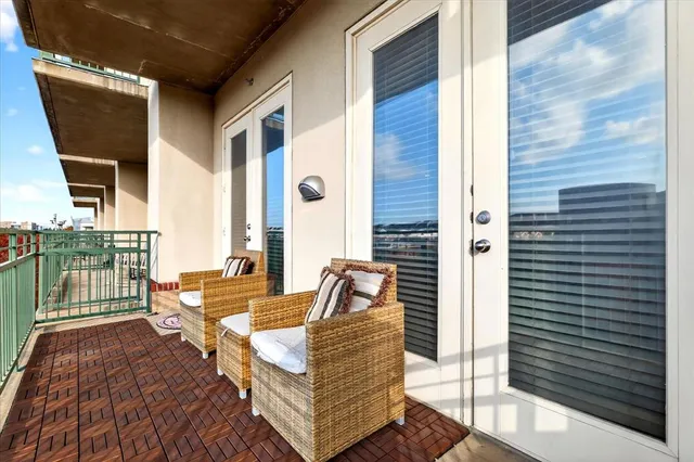 a balcony view with a couch