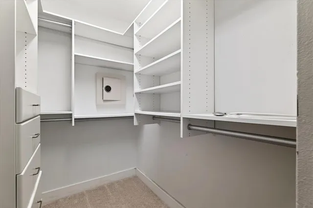a view of an empty walk in closet
