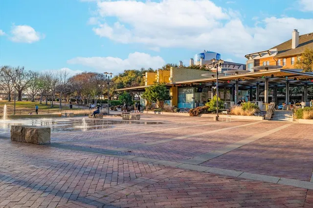 a view of a bench in a park