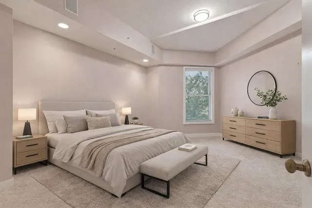 a bedroom with a bed and furniture