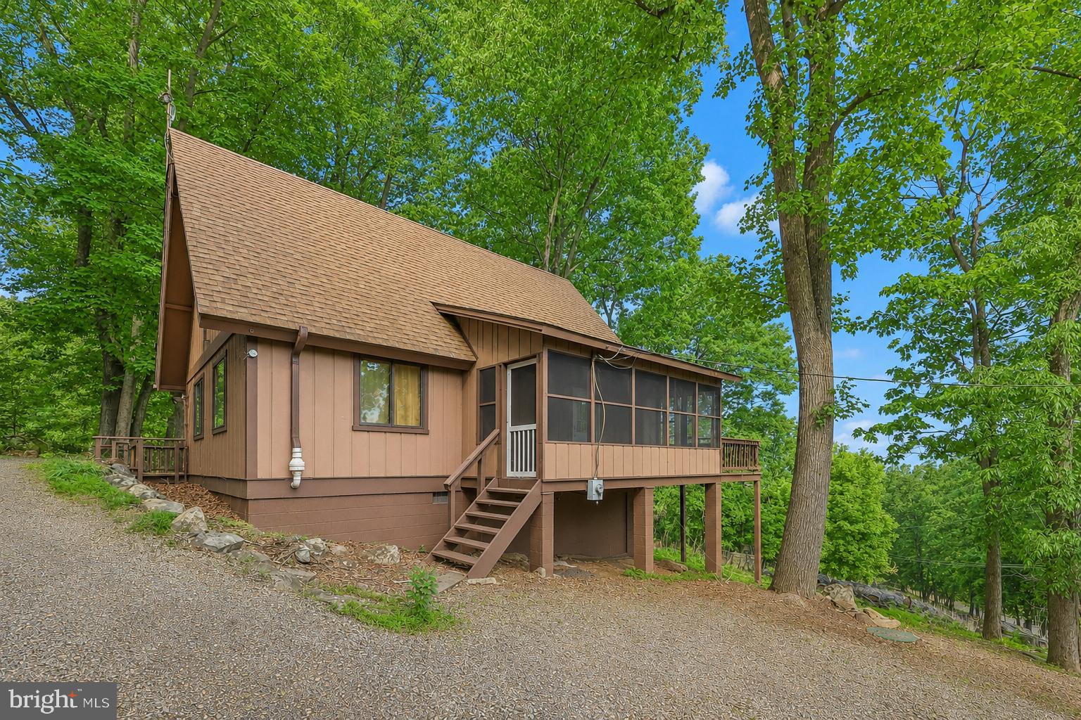 758 Club House Road Front Royal, VA 22630 - Photo 35 of 50 a backyard of a house with barbeque oven table and chairs