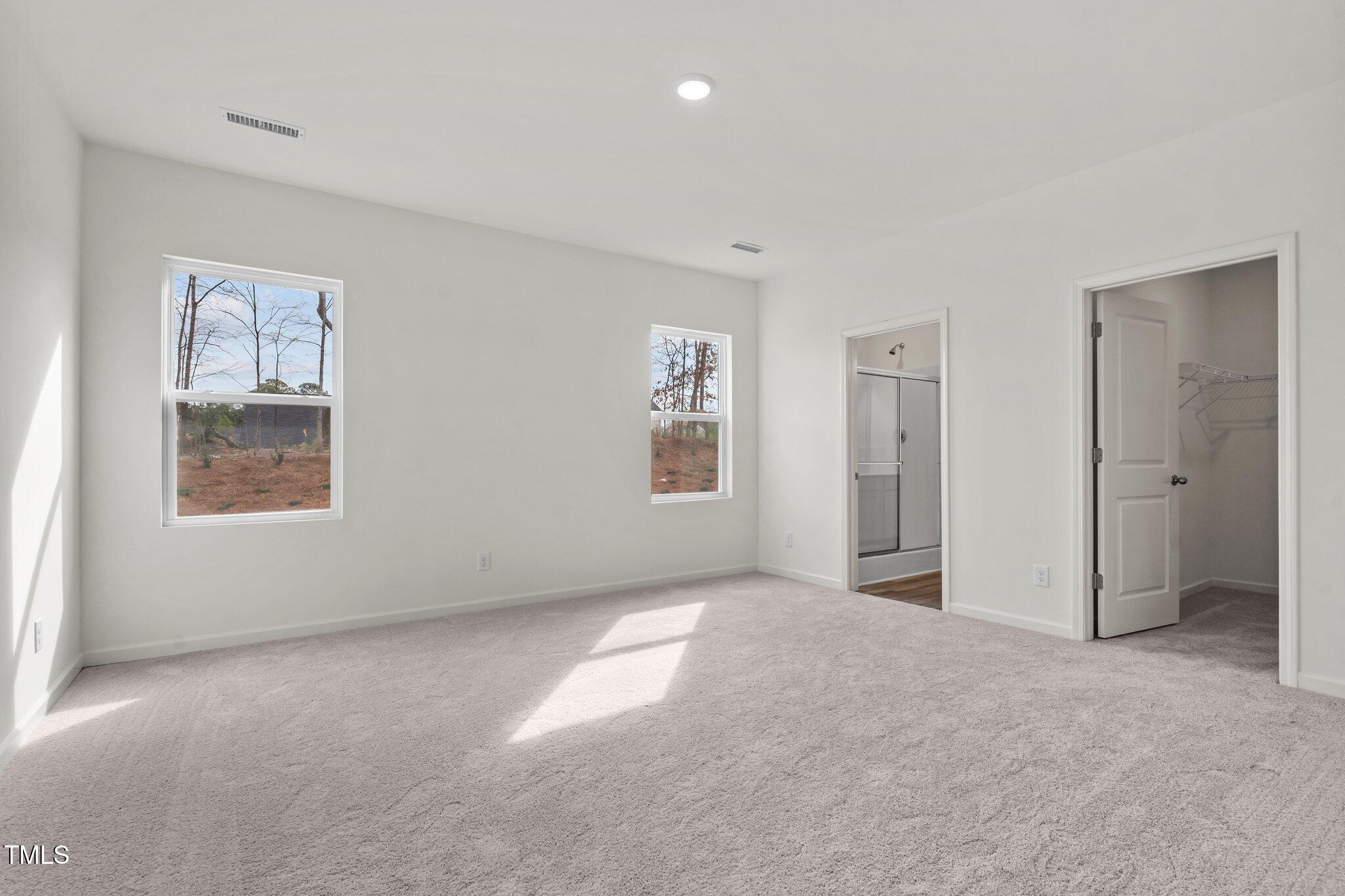 885 Embraer Way Spring Spring Hope, NC 27882 - Photo 25 of 35 a view of an empty room with a window