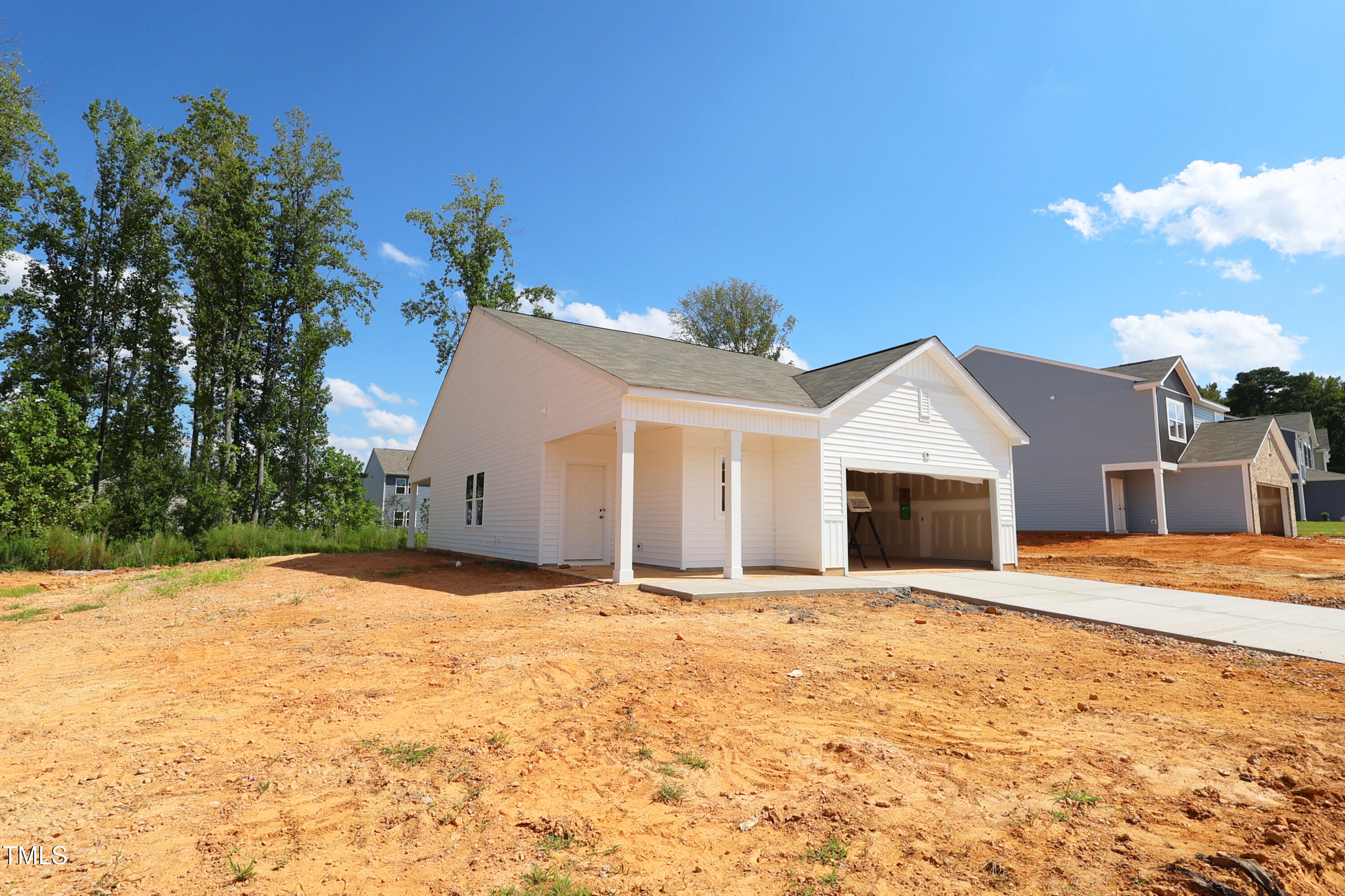 885 Embraer Way Spring Spring Hope, NC 27882 - Photo 4 of 35 a view of a house with a yard