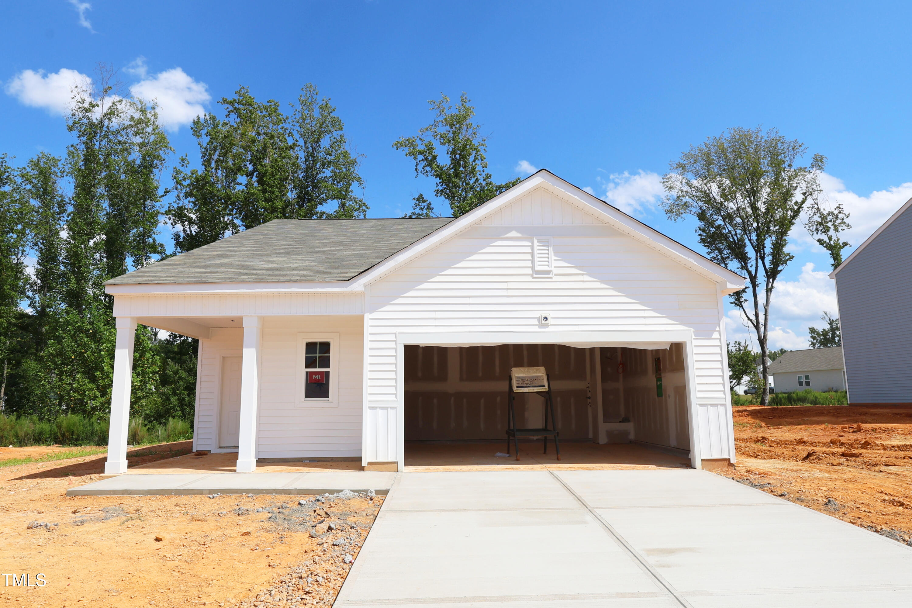 885 Embraer Way Spring Spring Hope, NC 27882 - Photo 5 of 35 a front view of a house with a yard