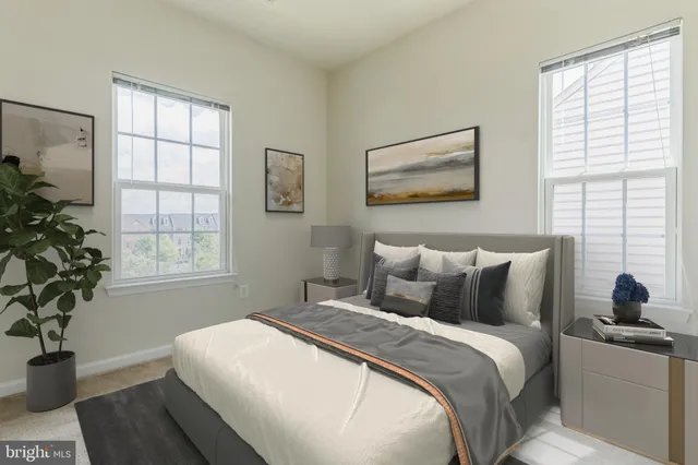 a bedroom with bed and window