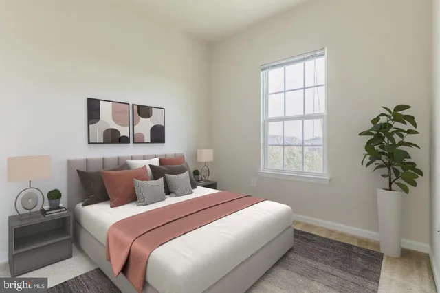 a bedroom with bed and a window