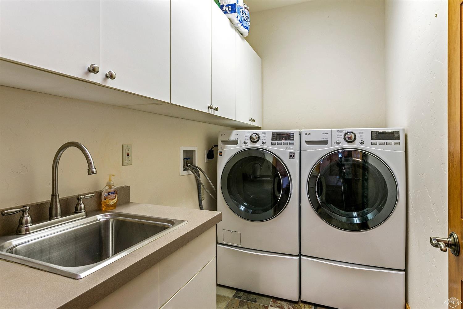 49 Knudson Ranch Road Edwards, CO 81632 - Photo 12 of 20 a utility room with sink dryer and washer