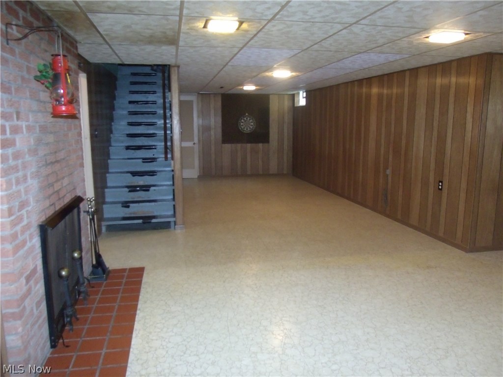 934 Yankee Run Road Masury, OH 44438 - Photo 24 of 34 Family/recreation room in basement. Wood burning fireplace.