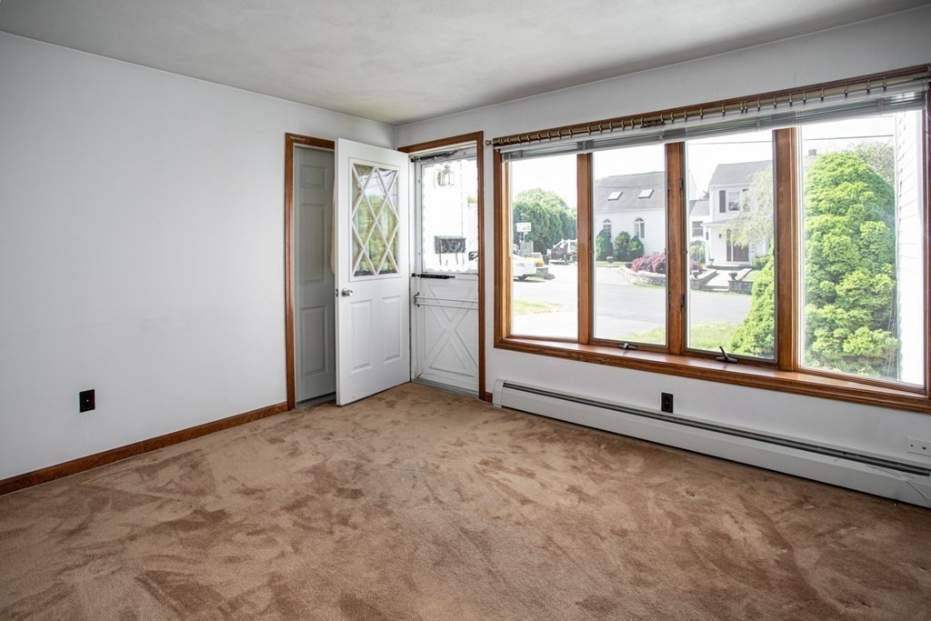 140 Riley Avenue Somerset, MA 02726 - Photo 3 of 29 a view of an empty room with window