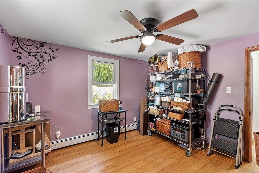 111 Wheeler Road Princeton, MA 01541 - Photo 20 of 42 a view of a workspace with furniture and a window