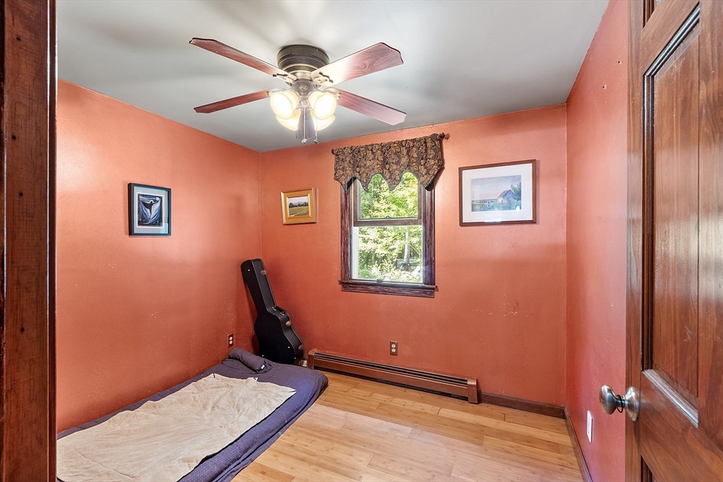 111 Wheeler Road Princeton, MA 01541 - Photo 22 of 42 wooden floor in an empty room with a window