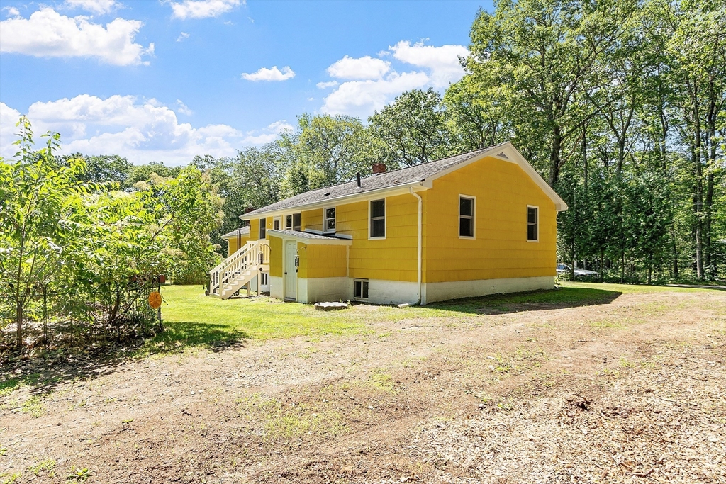 111 Wheeler Road Princeton, MA 01541 - Photo 24 of 42 a view of a house with a yard