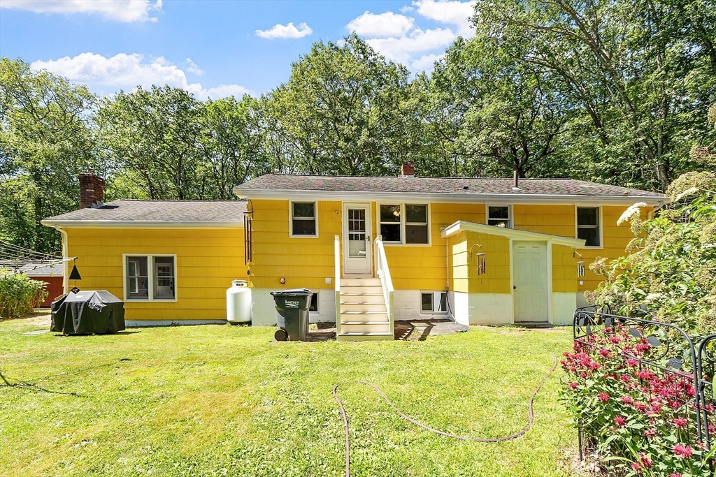 111 Wheeler Road Princeton, MA 01541 - Photo 25 of 42 a view of a house with a backyard