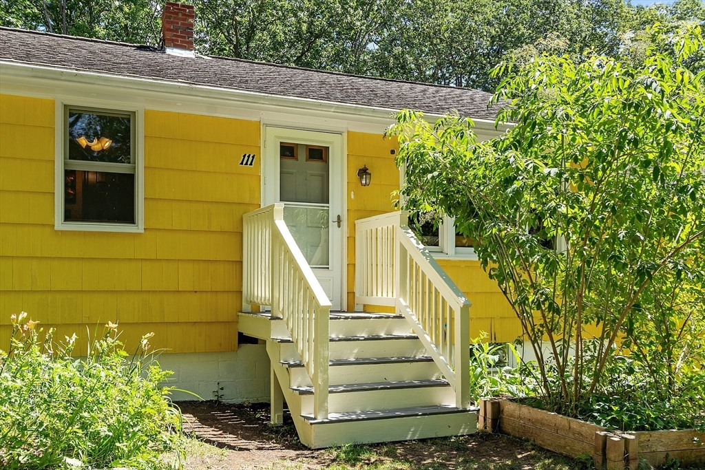 111 Wheeler Road Princeton, MA 01541 - Photo 3 of 42 a view of wooden house with a small yard