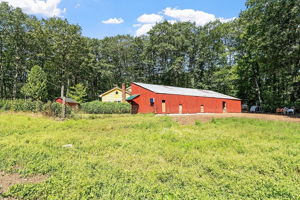 111 Wheeler Road Princeton, MA 01541 - Photo 36 of 42 swimming pool with an outdoor space and seating area