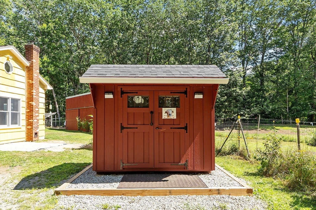 111 Wheeler Road Princeton, MA 01541 - Photo 41 of 42 a view of a backyard with a small cabin