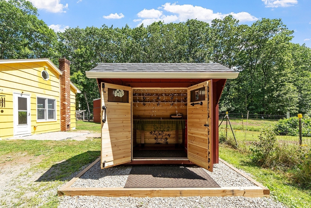 111 Wheeler Road Princeton, MA 01541 - Photo 42 of 42 a view of a entrance gate of the house and trees
