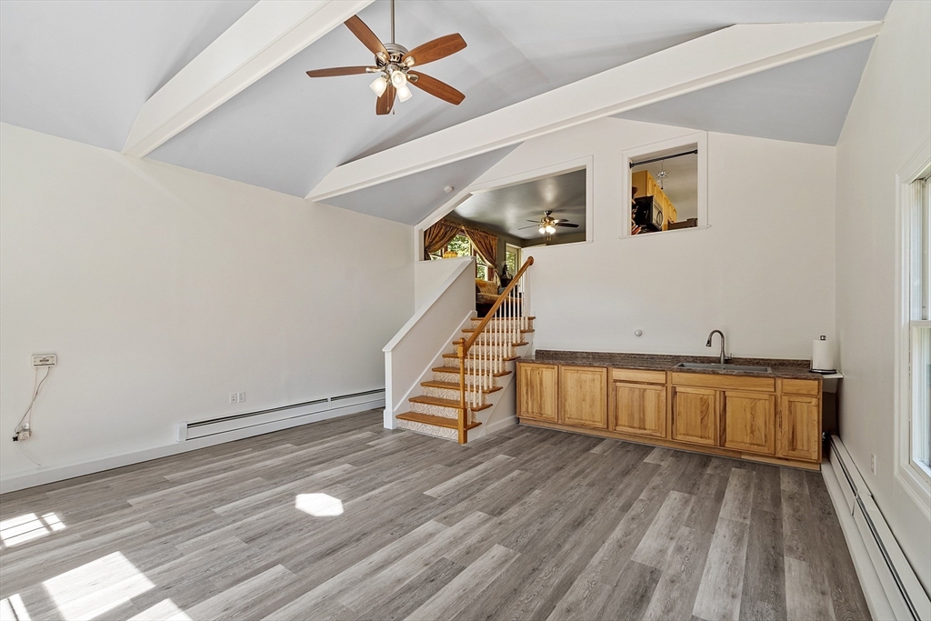 111 Wheeler Road Princeton, MA 01541 - Photo 9 of 42 a view of a room with wooden floor and stairs