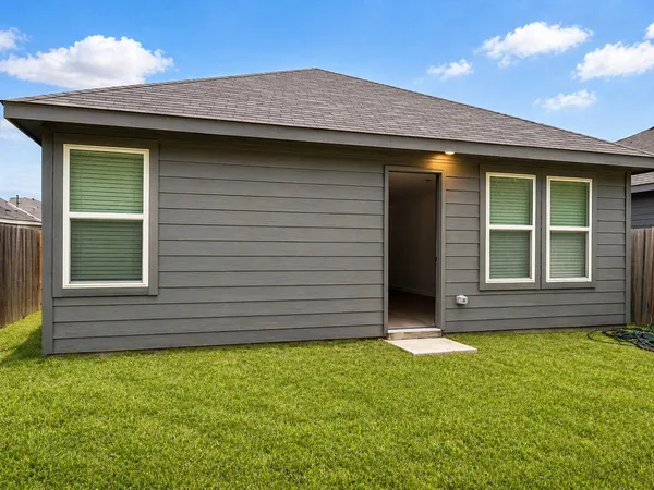 a view of outdoor space and front view of a house
