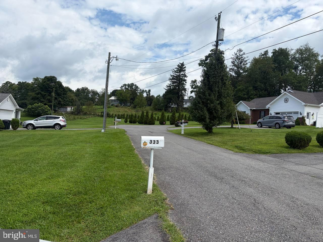 333 East Bailey Road Lewisburg, WV 24901 - Photo 21 of 57 Charming neighborhood with lush greenery.