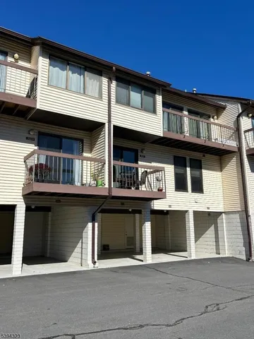 a front view of a building with balcony