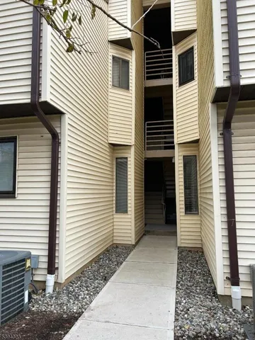 a front view of a building with balcony