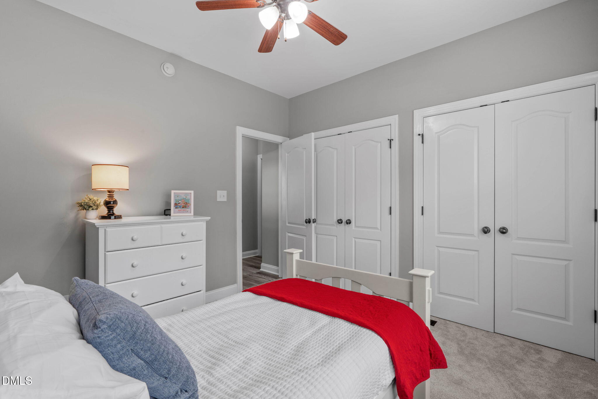 2450 Rolling Tracks Road Willow Spring, NC 27592 - Photo 38 of 64 a bedroom with a bed and a dresser