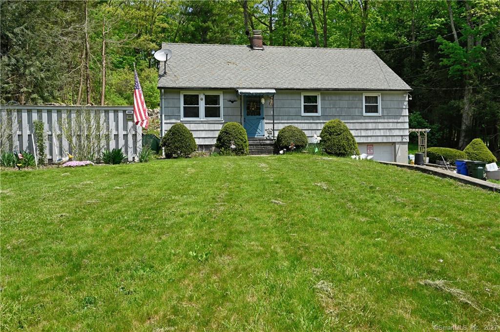 254 Colebrook Road Winchester, CT 06098 - Photo 1 of 1 a front view of a house with garden