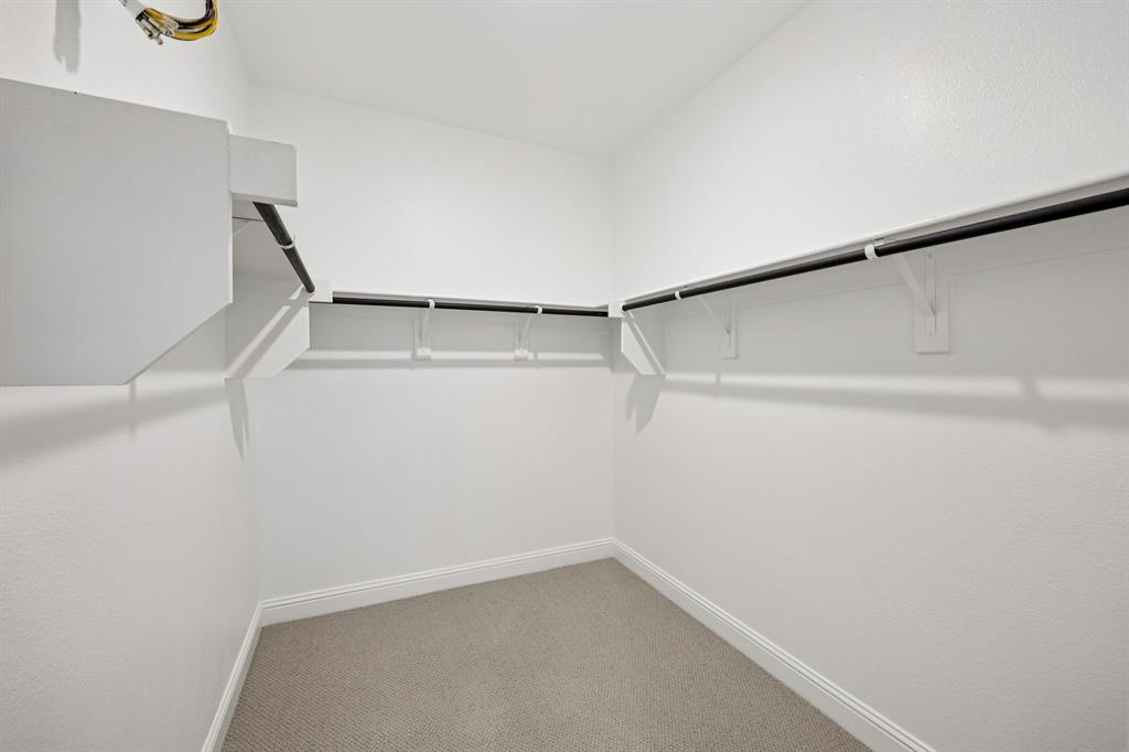 1721 Arches Road Anna, TX 75409 - Photo 27 of 39 a view of small space with racks on the wall