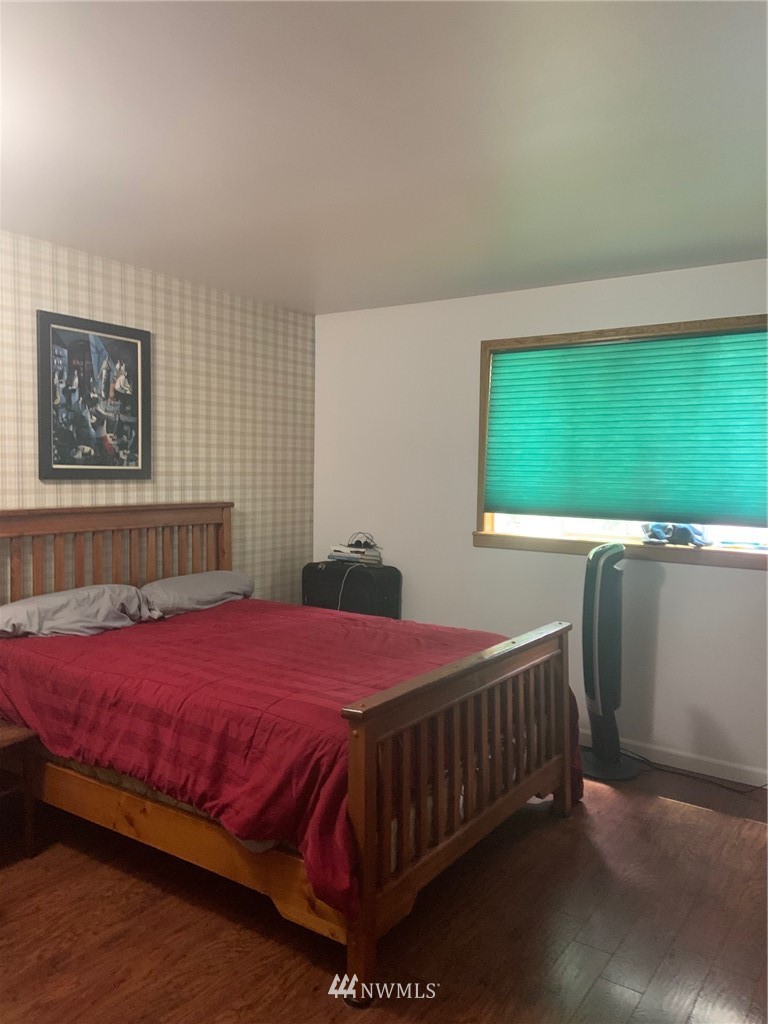 3302 198th Place Southeast Bothell, WA 98012 - Photo 11 of 19 a bedroom with a bed and window
